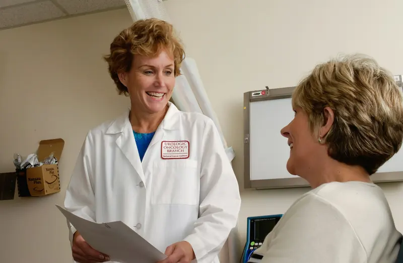 A provider reviewing a treatment plan with a guest